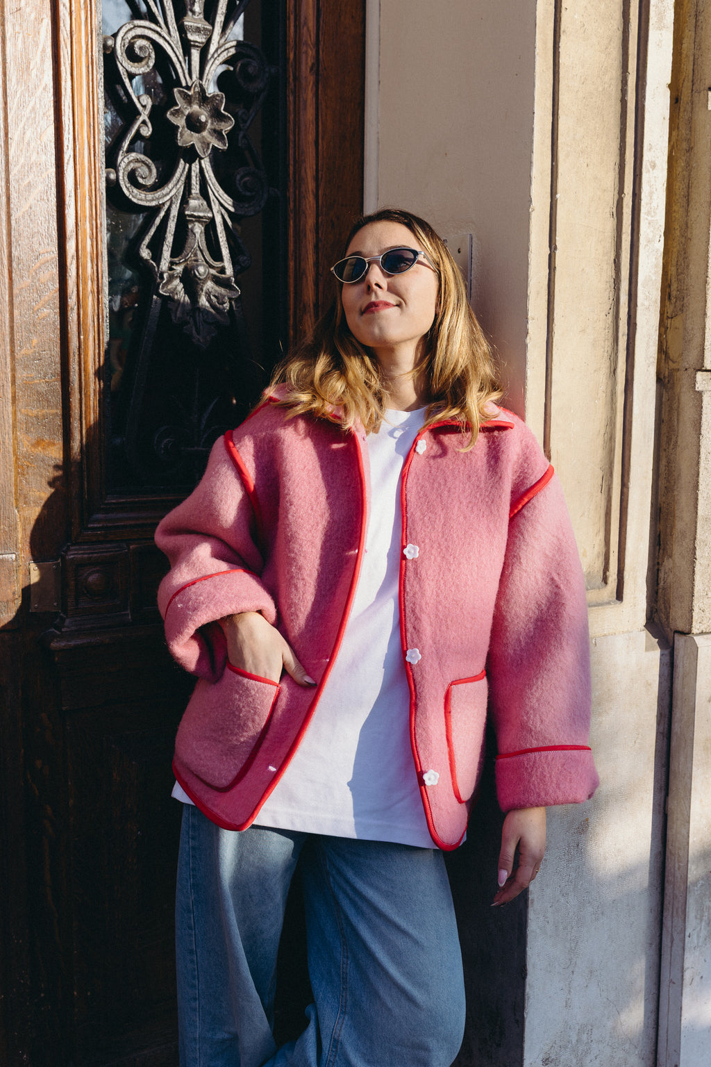 Veste en laine rose et rouge