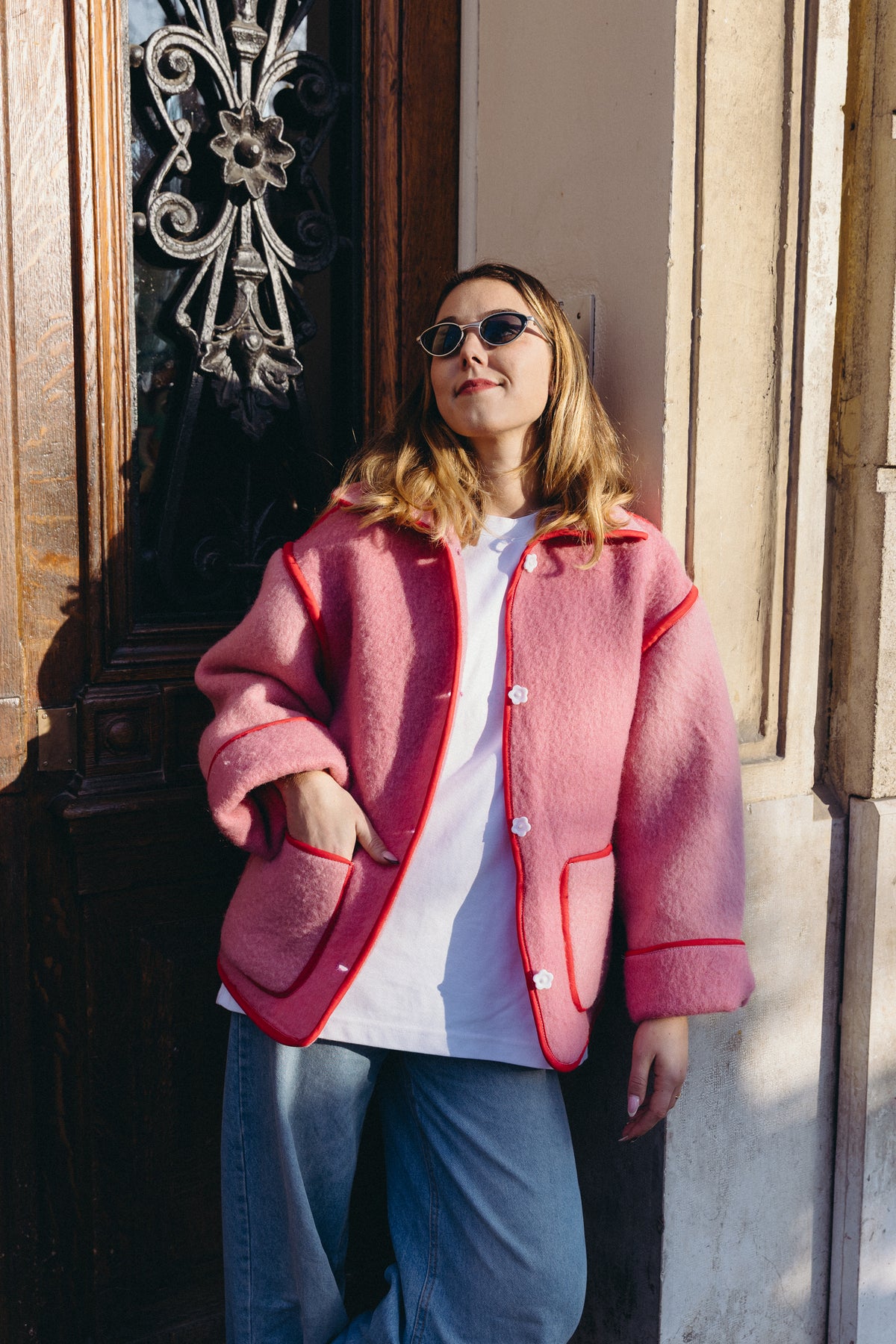 Veste en laine rose et rouge