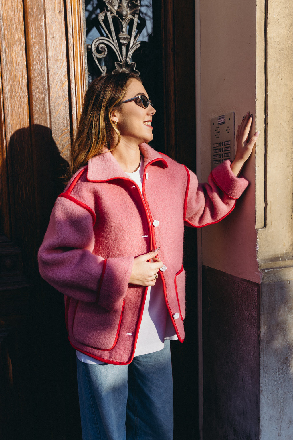Veste en laine rose et rouge