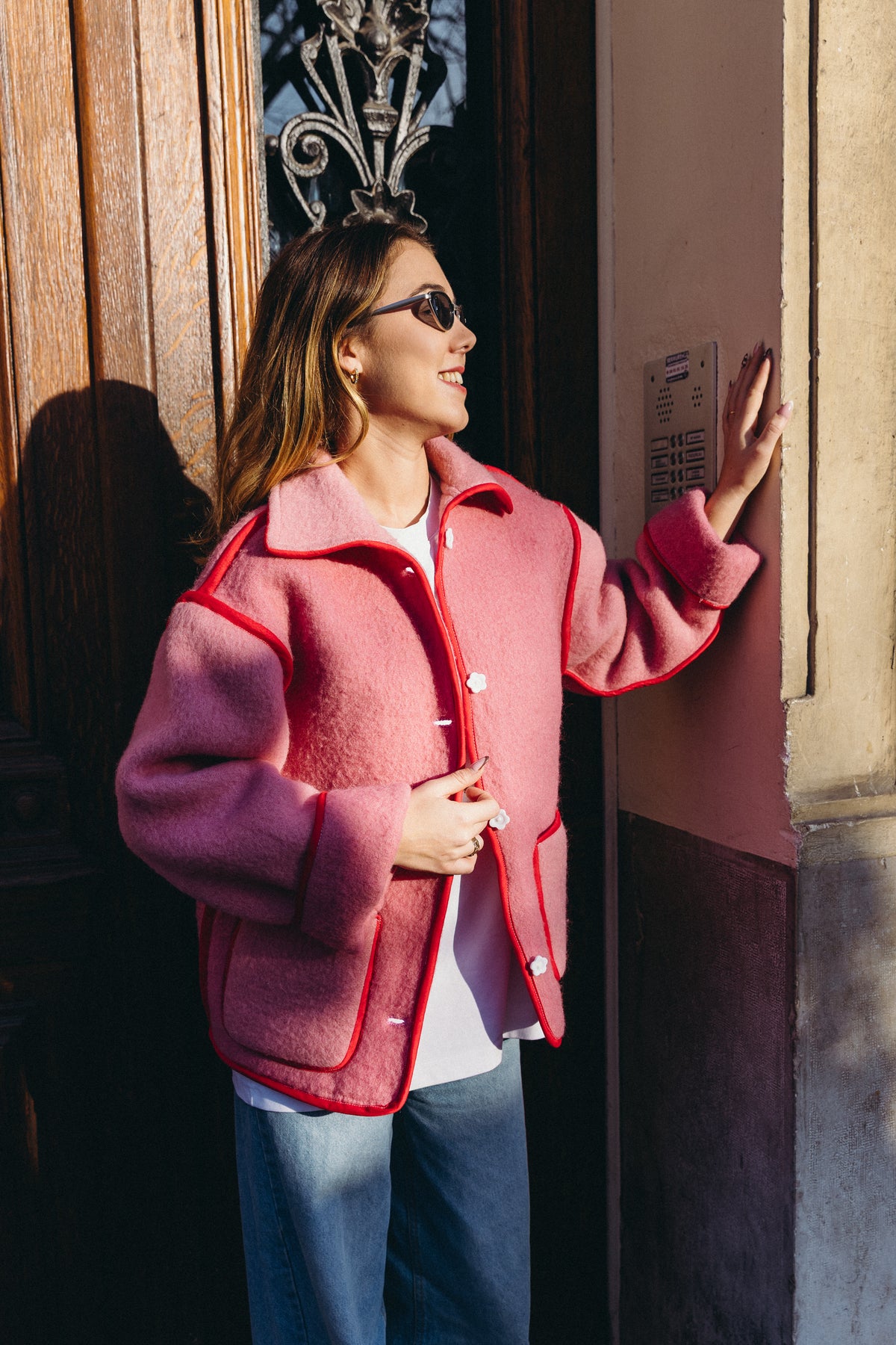 Veste en laine rose et rouge