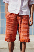 Orange Bermuda shorts
