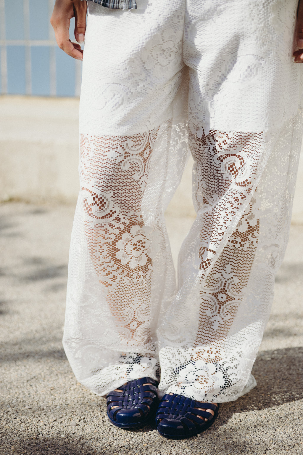 White lace trousers
