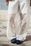 White lace trousers