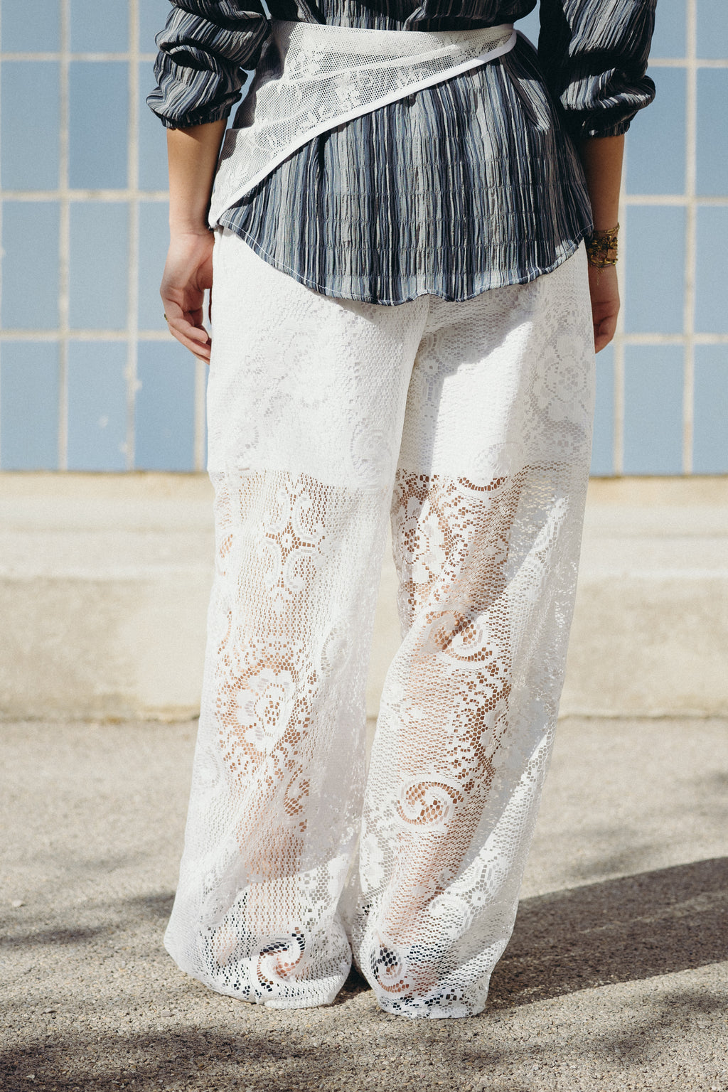 White lace trousers